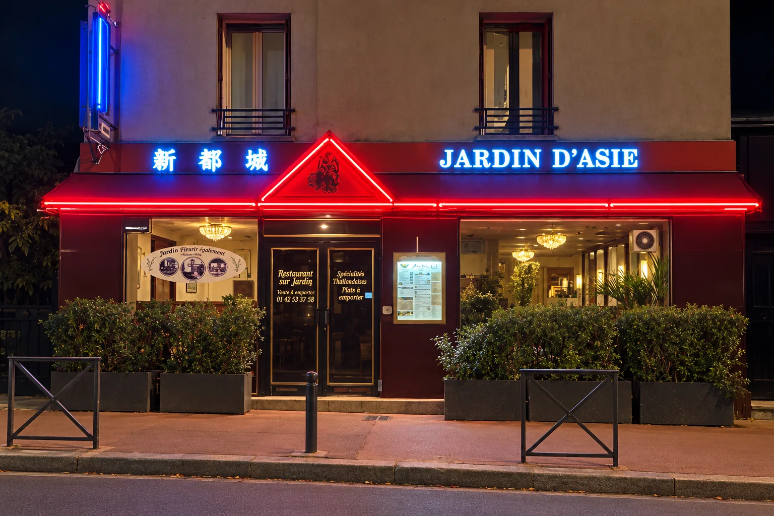 Jardin d'Asie front in the evening, blue and red neon sign