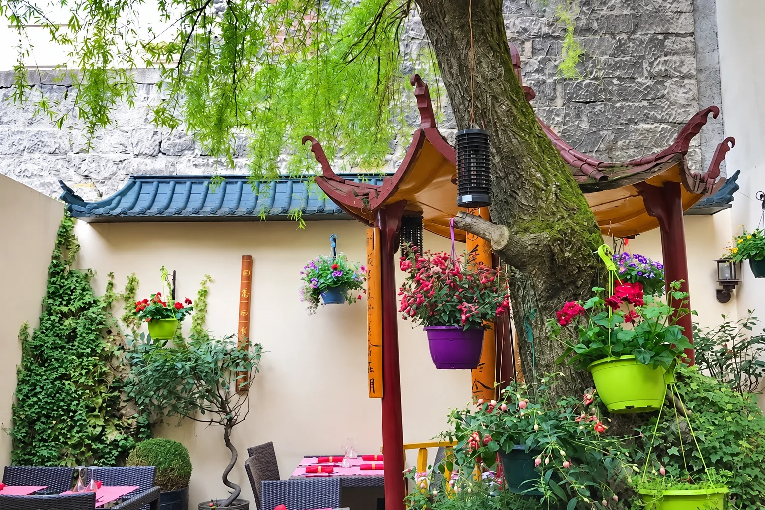 Garden with a tree and small decorative structure
